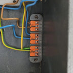 Suitable for WAGO 221 series: Mounting clips and organizers for securing and organizing terminal connectors.